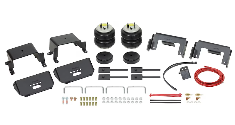 Firestone Helper Spring Kit by Indiana Trailer Sales, frame-mounted air springs with brackets and hardware for truck leveling.