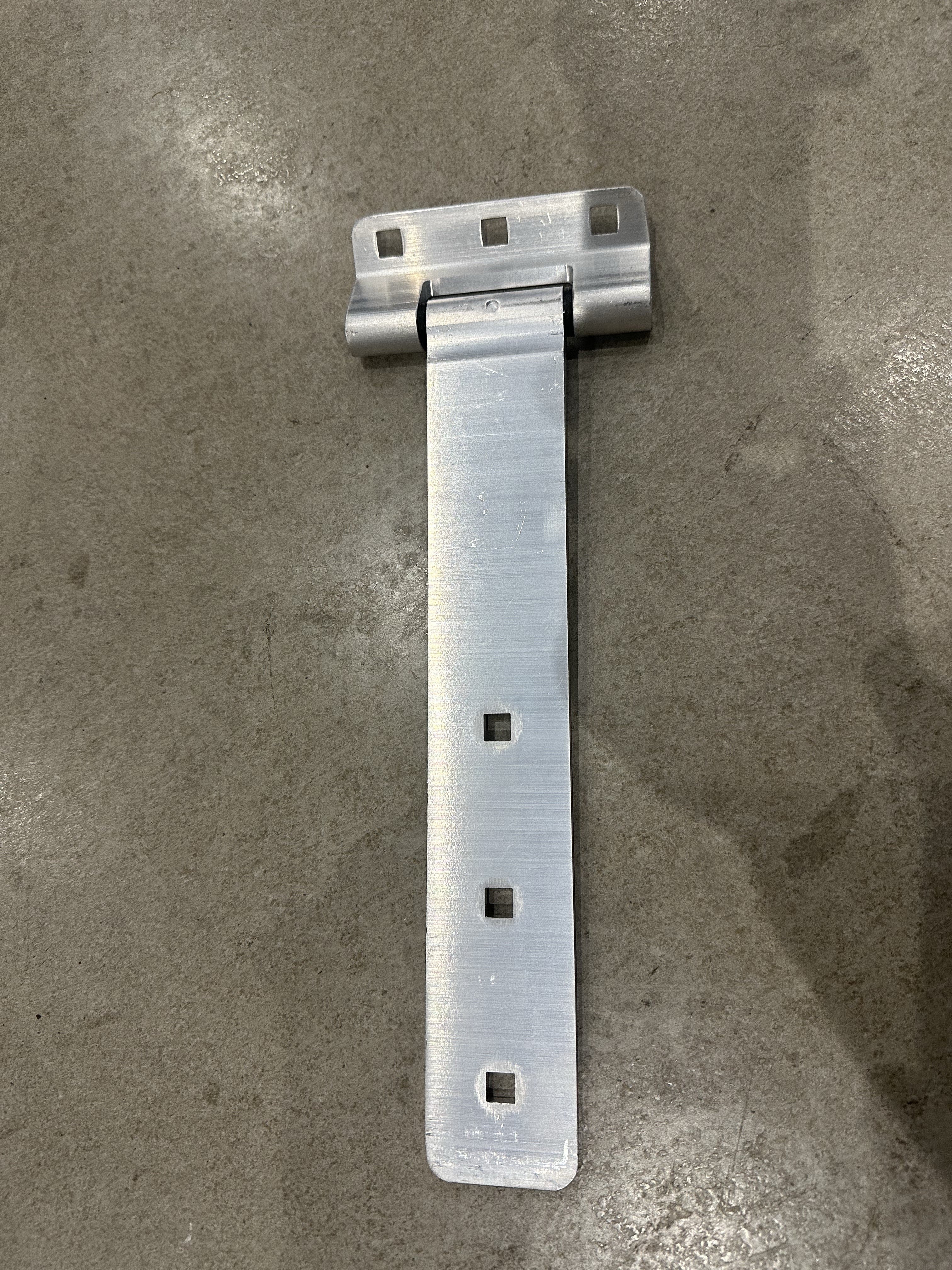 12-inch aluminum strap hinge for trailer body and frame, durable and lightweight from Indiana Trailer Sales.