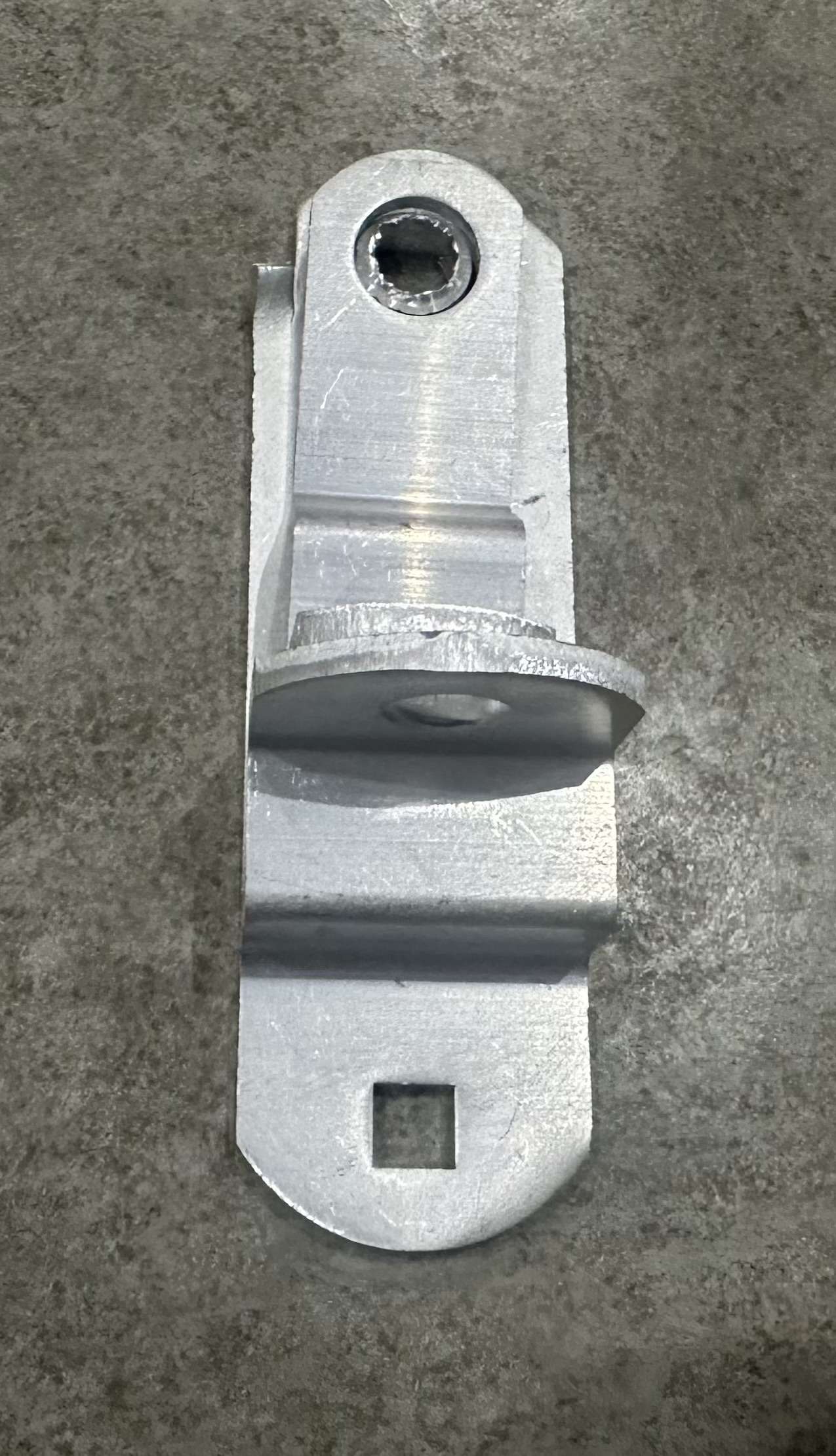 Aluminum Cambar hasp from Indiana Trailer Sales for trailer body and frame security, shown on a trailer component.