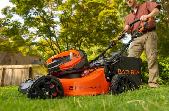 80V dual port 12-inch mower with sturdy build, designed for efficient yard trimming and lawn maintenance.