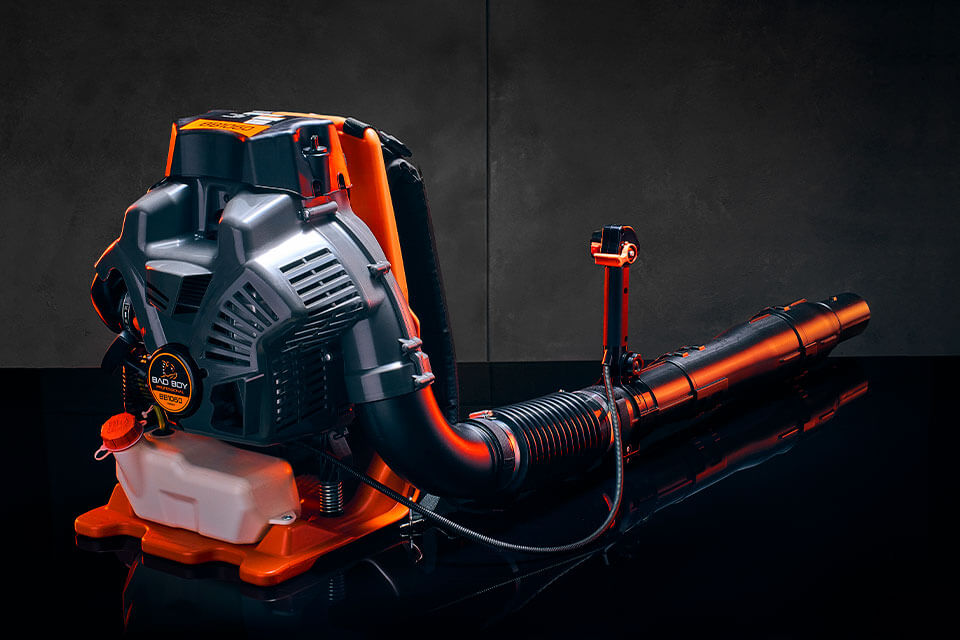 Bad Boy 1060 backpack blower from Indiana Trailer Sales, showing the handheld power tool with ergonomic design and engine details.