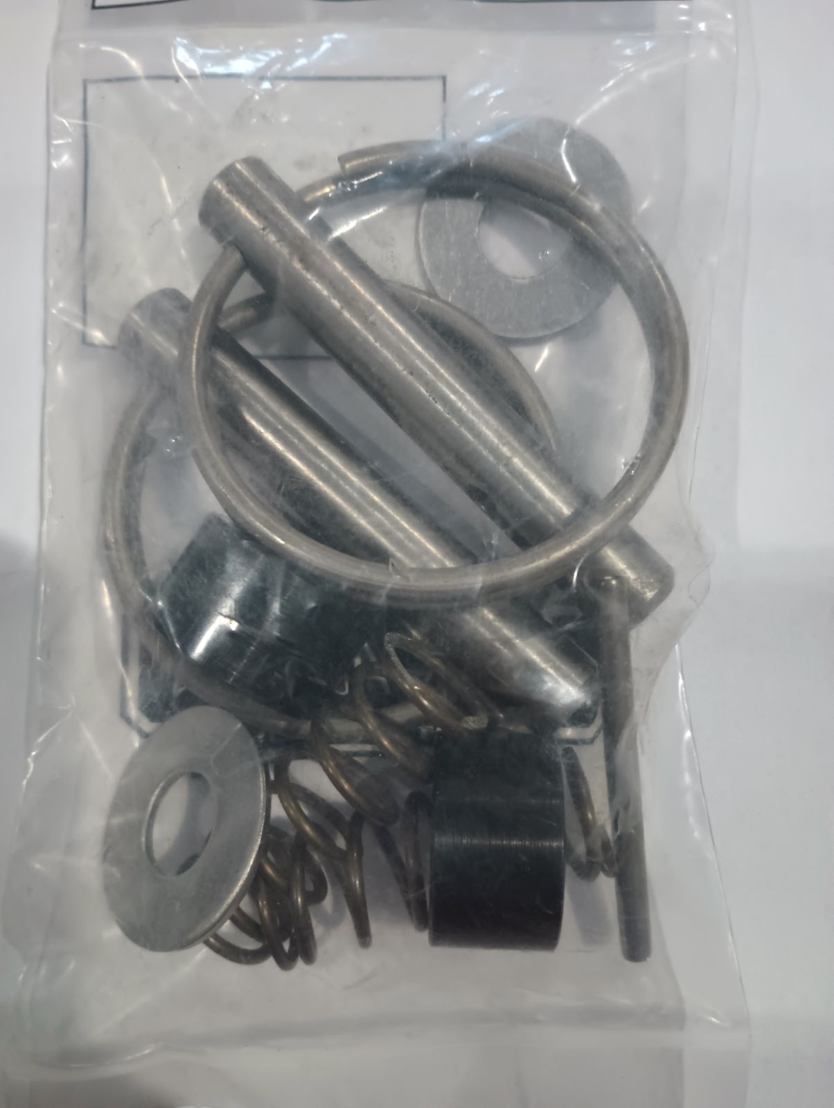Sno-Way latch pin kit for snow plows, featuring durable metal pins and mounting hardware, used for secure attachment.