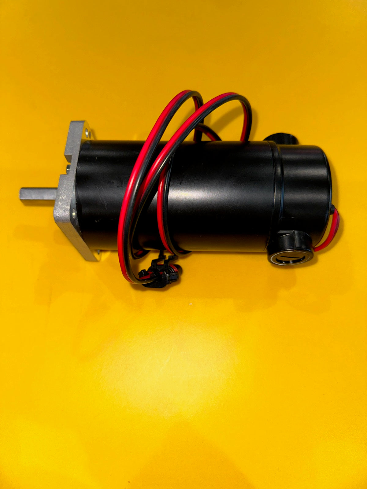 Sno-Way tailgate spreader motor with 0.33 HP, designed for snow and ice control, shown in a detailed view.