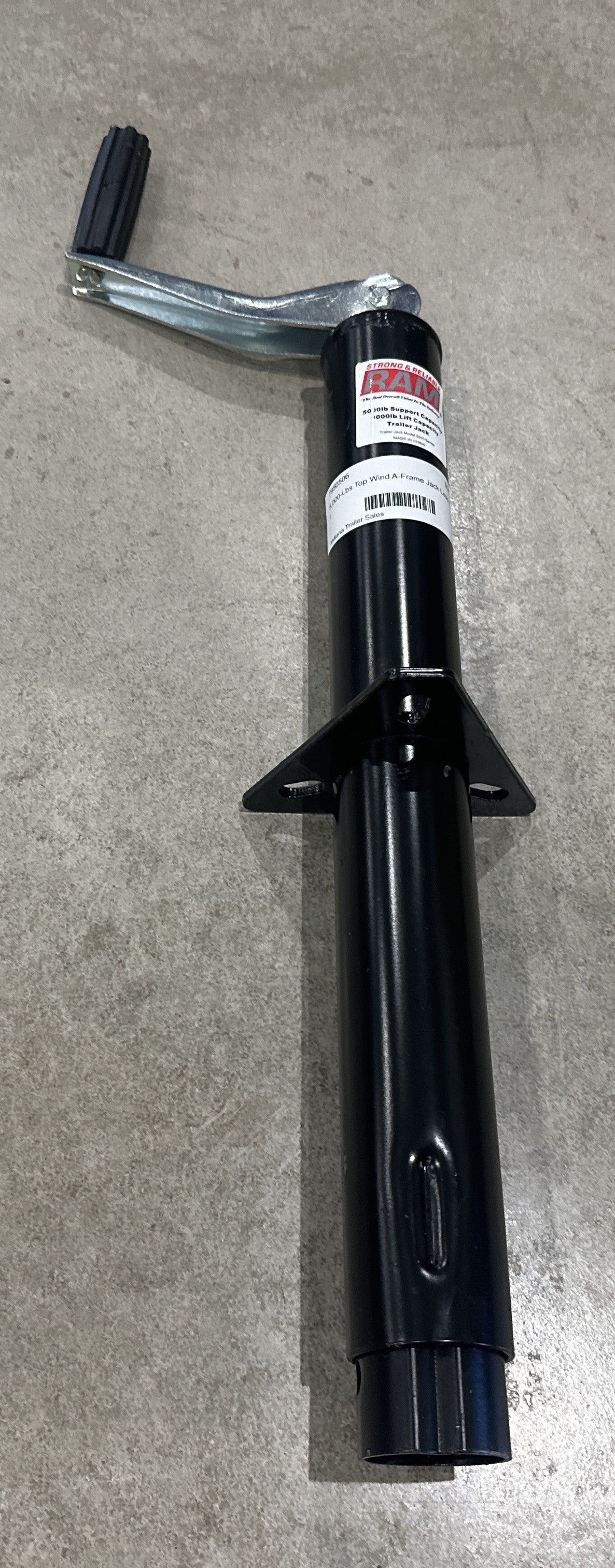 Heavy-duty Indiana Trailer Sales 5,000-lb top wind A-frame jack with less foot for trailer stabilization and lifting.