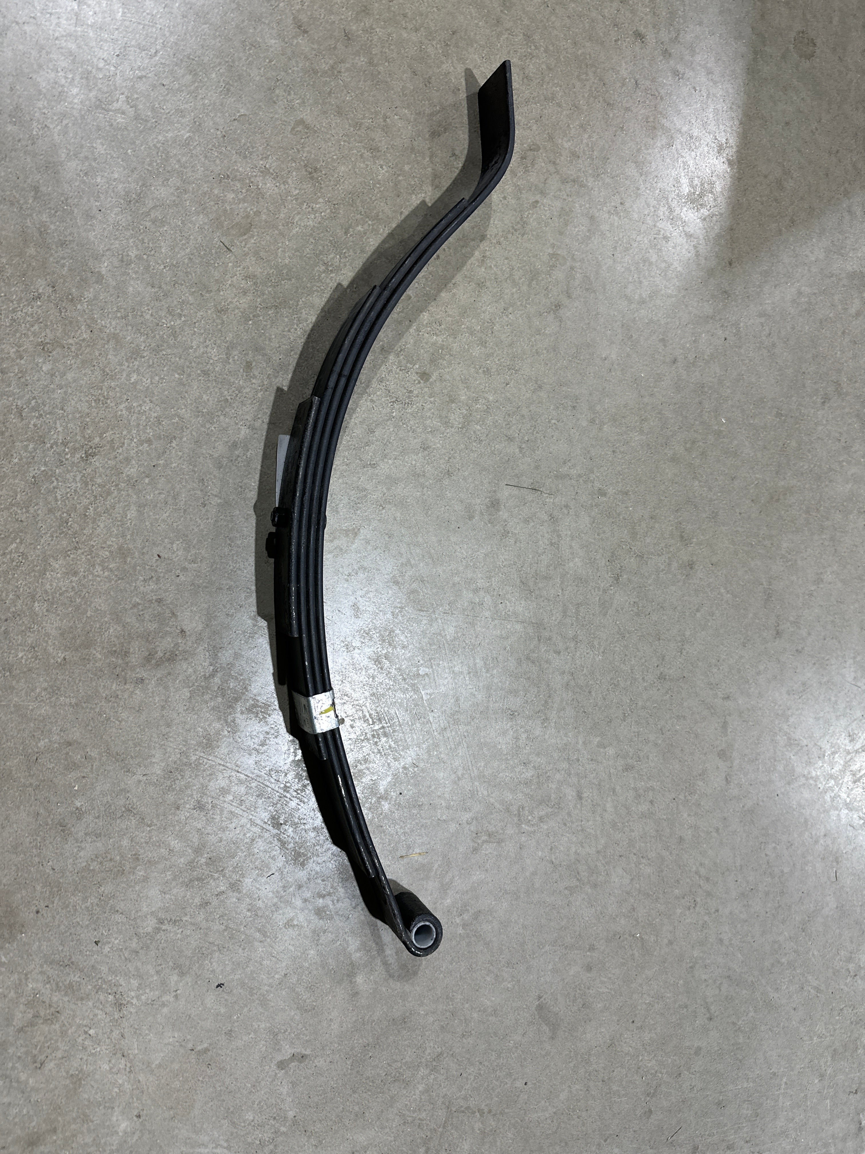 Suspension slipper from Indiana Trailer Sales, measuring 1.75x24.62 inches, with black rubber and metal components.
