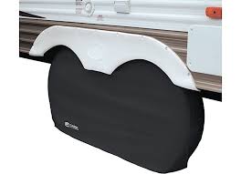 Black dual axle wheel cover for trailers, showcasing durable trailer accessories by Indiana Trailer Sales.