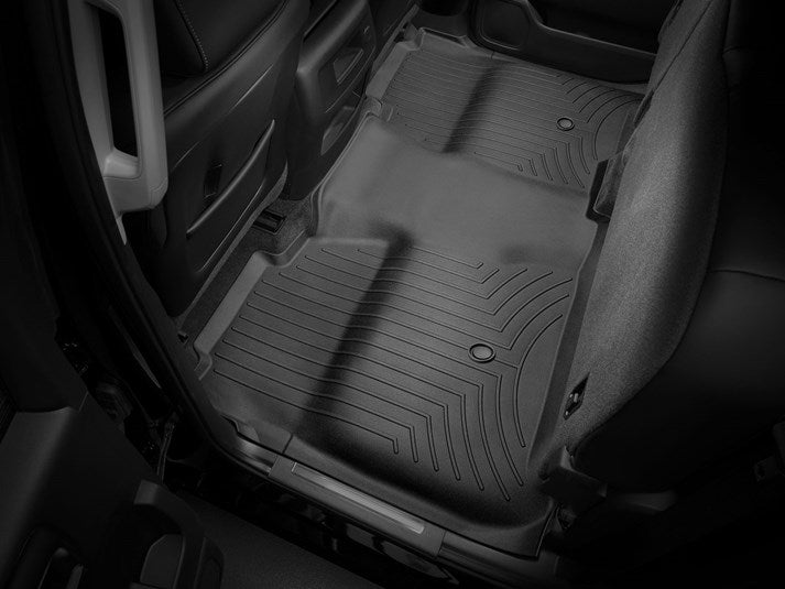 Weather Tech rear liners for 2014-2019 Chevy Silverado truck, durable waterproof truck accessories for cargo protection.
