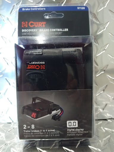 Curt Discovery Brake Control for vehicles, electrical and lights system, installed in a vehicle dashboard.