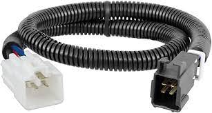 Curt Manufacturing trailer brake controller harness for electrical and lights, showing connectors and wiring for secure installation.