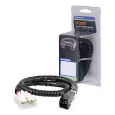 Curt Manufacturing trailer brake controller harness packaged, with electrical wiring and connectors for trailer brake system installation.