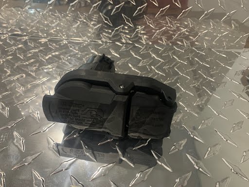 Curt OEM replacement dual-output 7 and 4-way connector for USCAR electrical and lighting system, shown plugged into vehicle wiring.