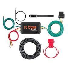 Curt Manufacturing 59190 powered 3-to-2 wire taillight converter for vehicle electrical and lighting systems.