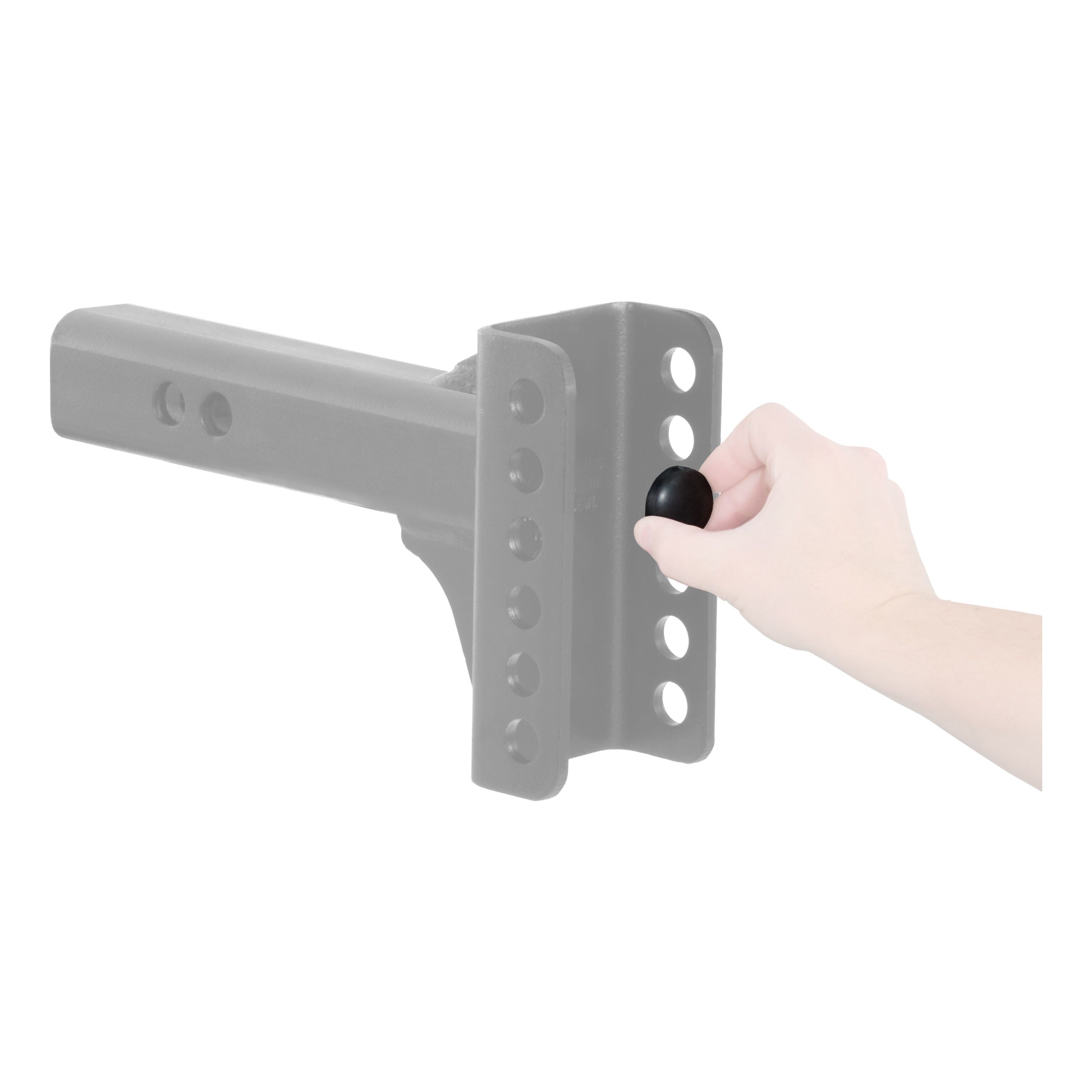 Curt 45921 adjustable channel mount anti-rattle rubber bumper attached to hitch for reducing noise and movement.