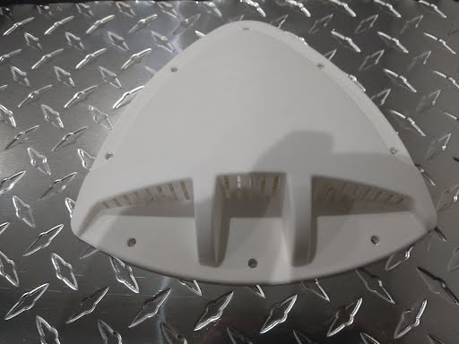 White flow-through exterior vent for trailer body and frame by Discovery Cargo Trailers, Inc.