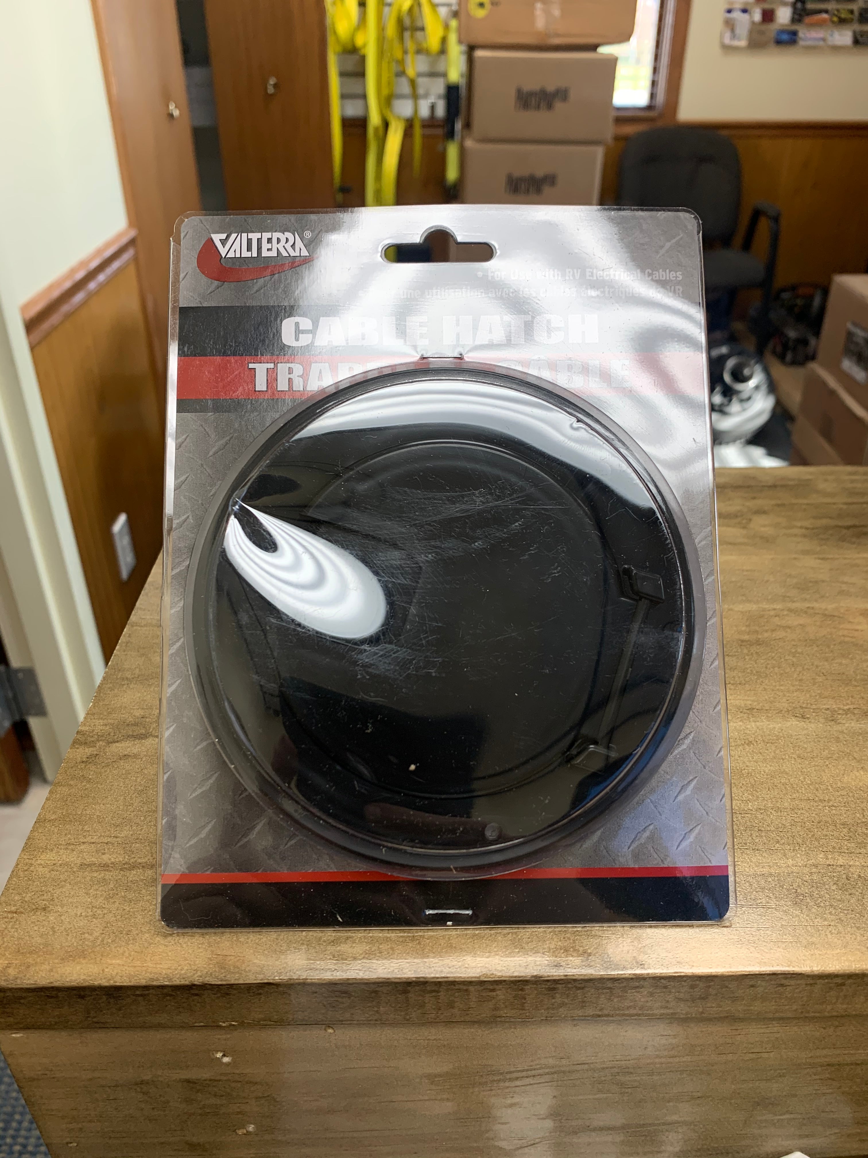 Large round black cable hatch from Meyer Distributing, suitable for electrical and lighting applications, durable and weather-resistant.