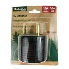 Weekender ParkPower RV adapter with 15A male and 30A female connections, one-piece design for RV electrical hookups.