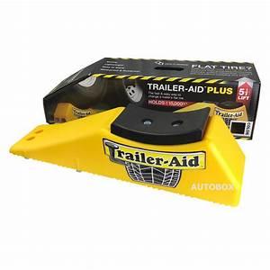 Yellow Trailer Aid towing safety accessory designed for quick trailer leveling and tire change assistance.