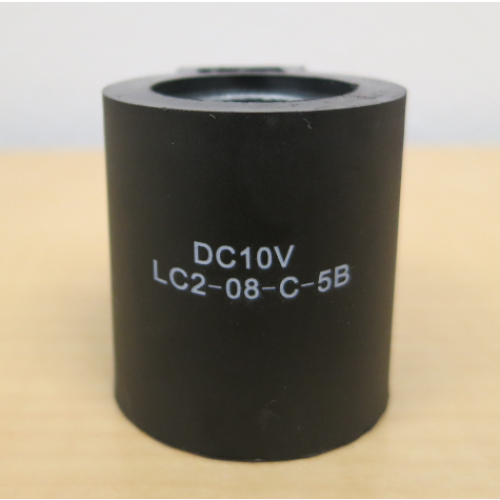 Hydraulics coil round LC-08-C-5D KTI by PJ Trailers MFG Inc., showing a close-up of the hydraulic component with metal fittings