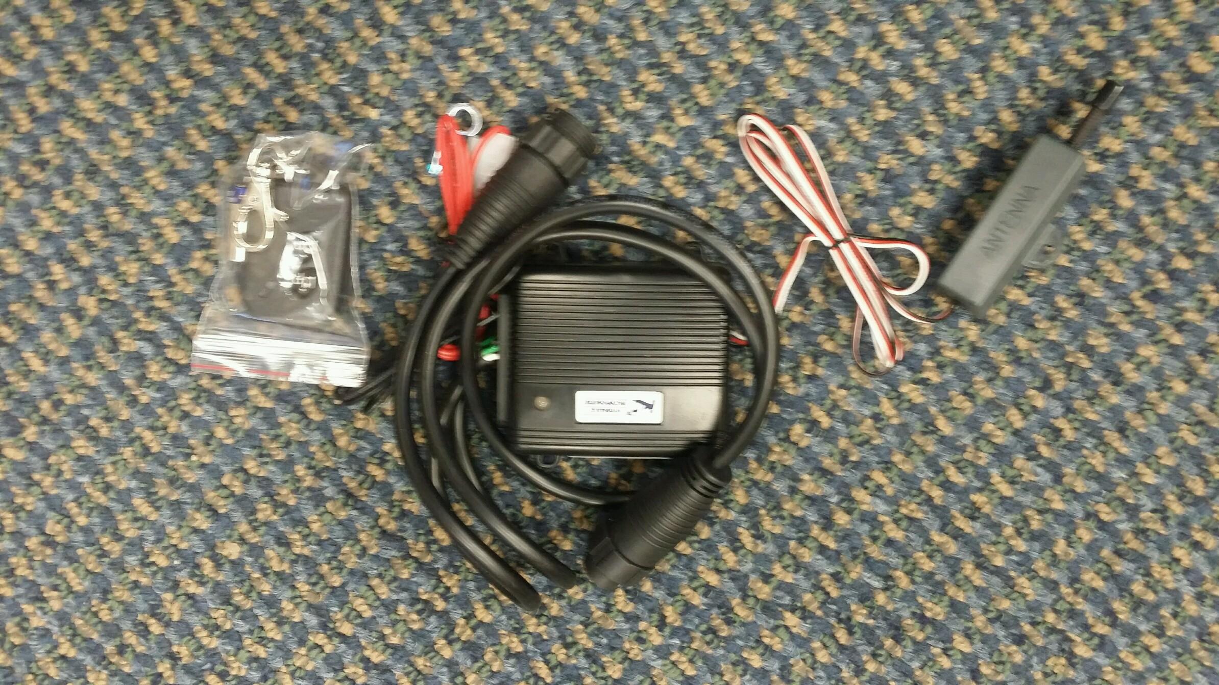 Hydraulics KTI Wireless Remote Kit by PJ Trailers MFG, Inc. featuring a compact remote control for hydraulic system operation.