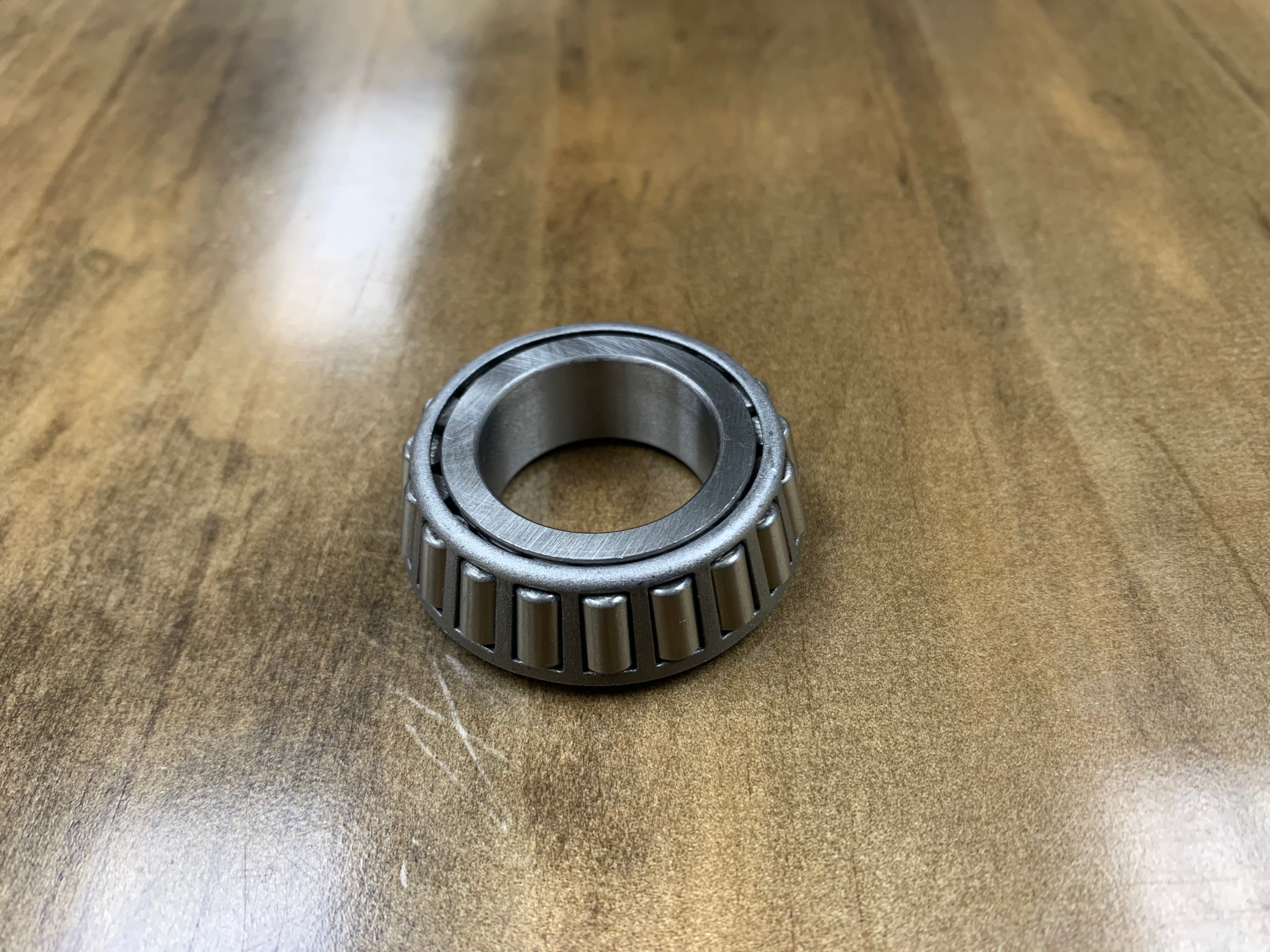 Tex Trail bearing cone L44643 with 1.00-inch inner diameter, part of axle components, shown in the image.