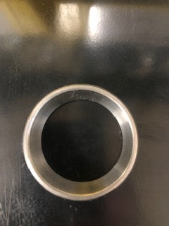 Tex Trail bearing race LM11910 with 1.781-inch outer diameter, used as axle component in vehicle assembly.