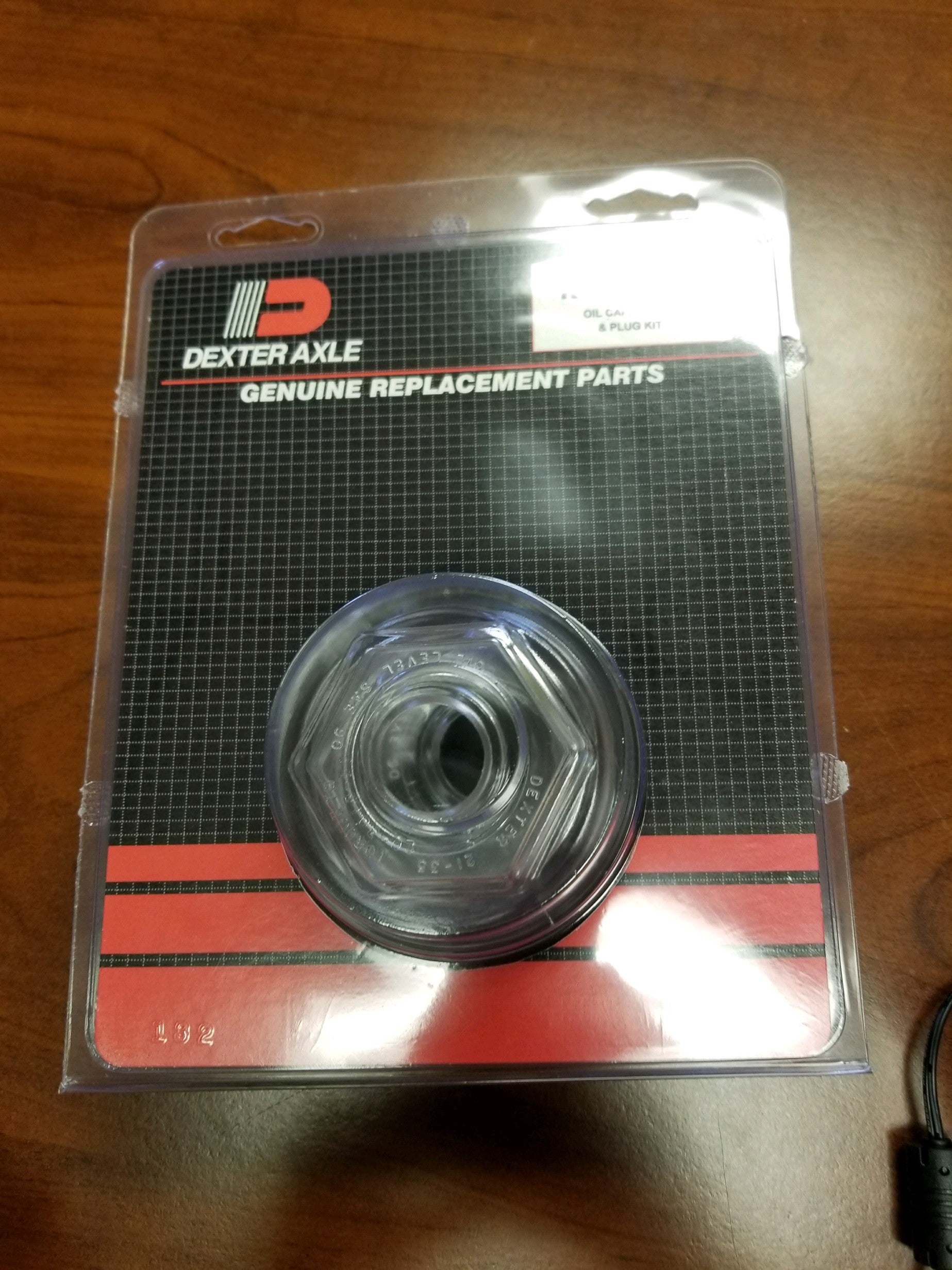 Tex Trail axle components oil cap kit with O-ring and plug, designed for maintenance and sealing of axle assemblies.