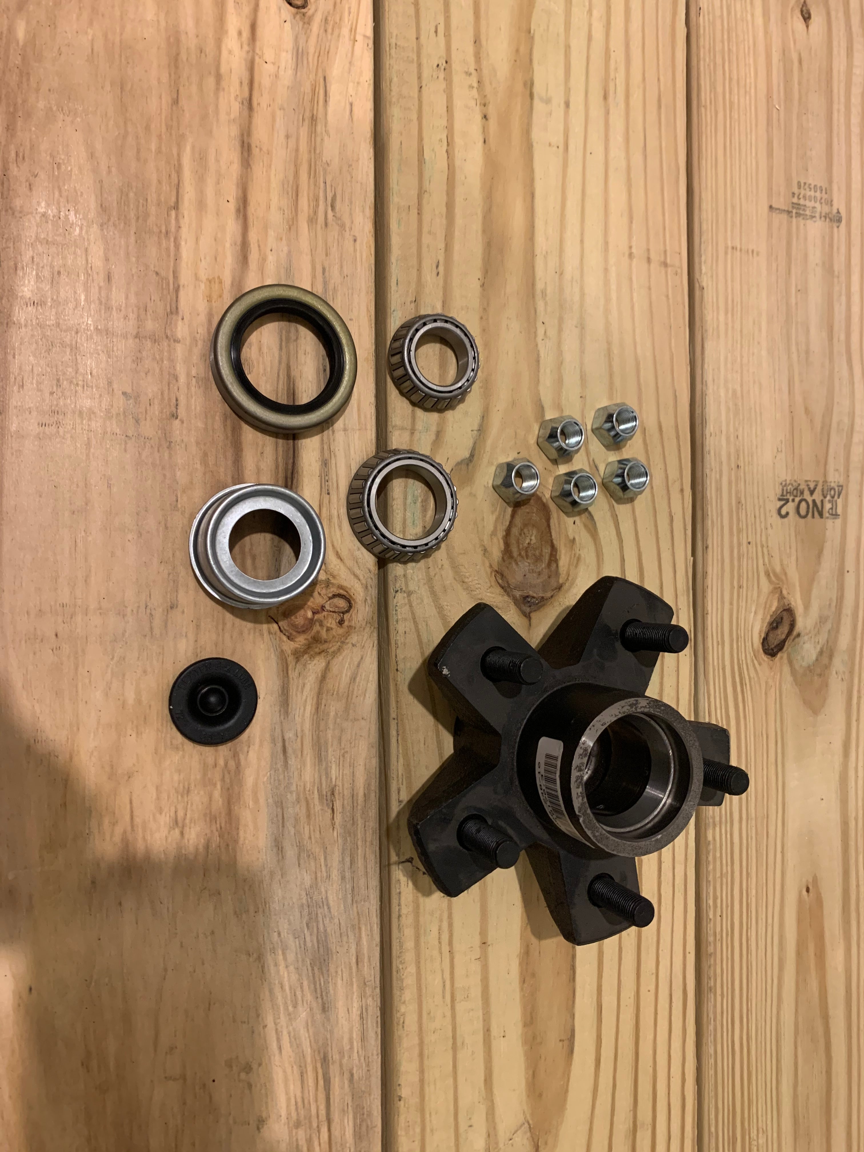 Tex Trail KIT HUB DX 3.5K axle component kit with bearings, seal, nuts, and cap for heavy-duty trailer axles.