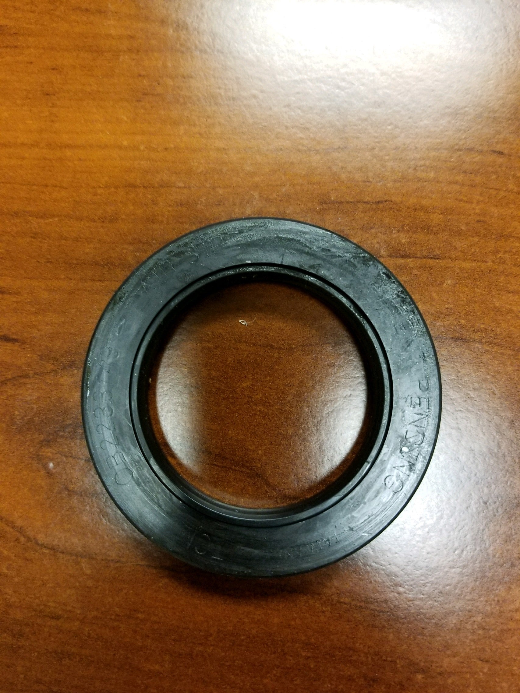 Tex Trail Seal Oil DX 5.2K-8K unitized axle seal with 3.376 inch outer diameter and 2.25 inch inner diameter for axle components.