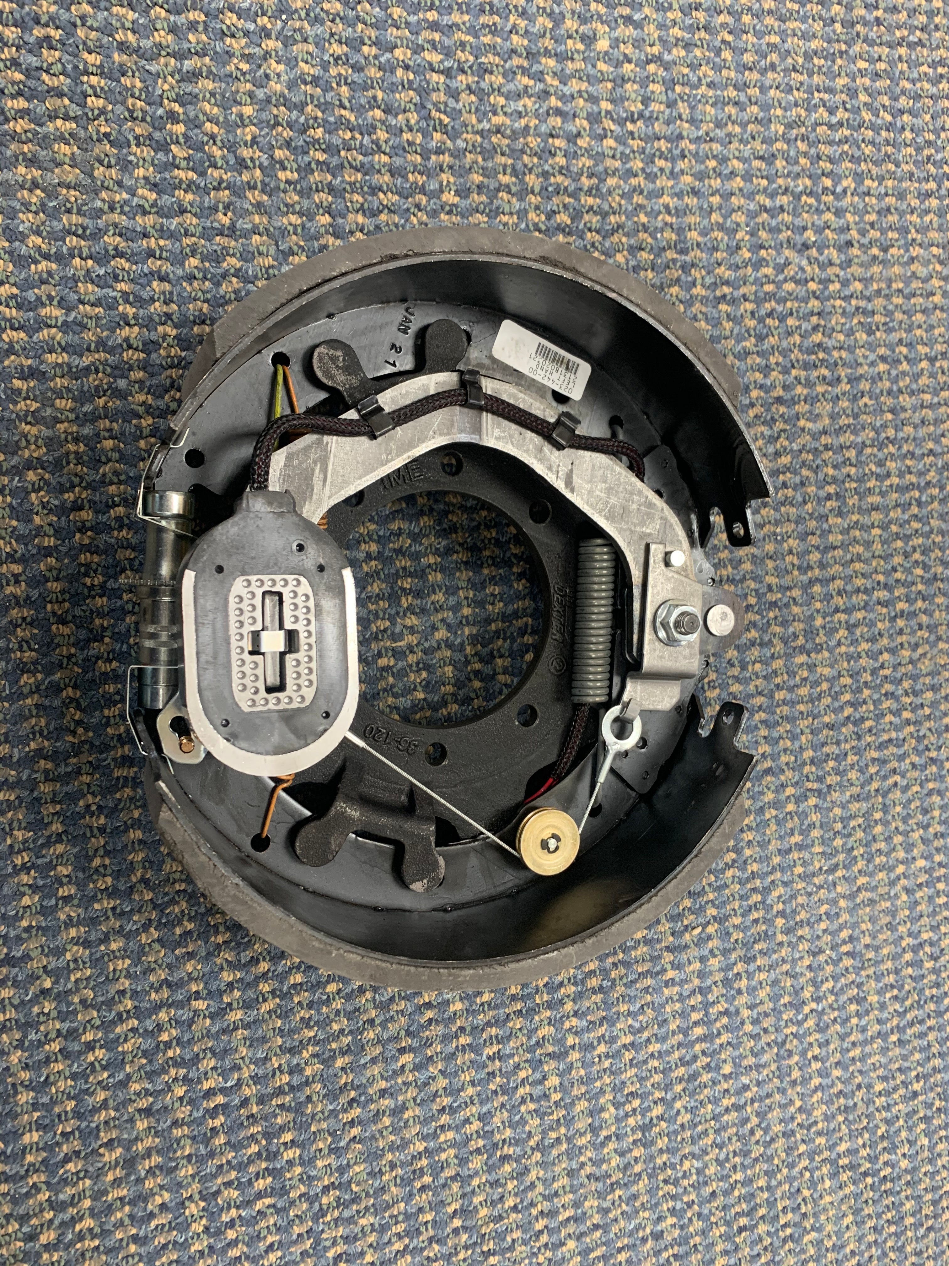 Tex Trail Dexter 12K Electric Left Hand Brake for heavy-duty vehicles, showing the brake assembly with mounting components.