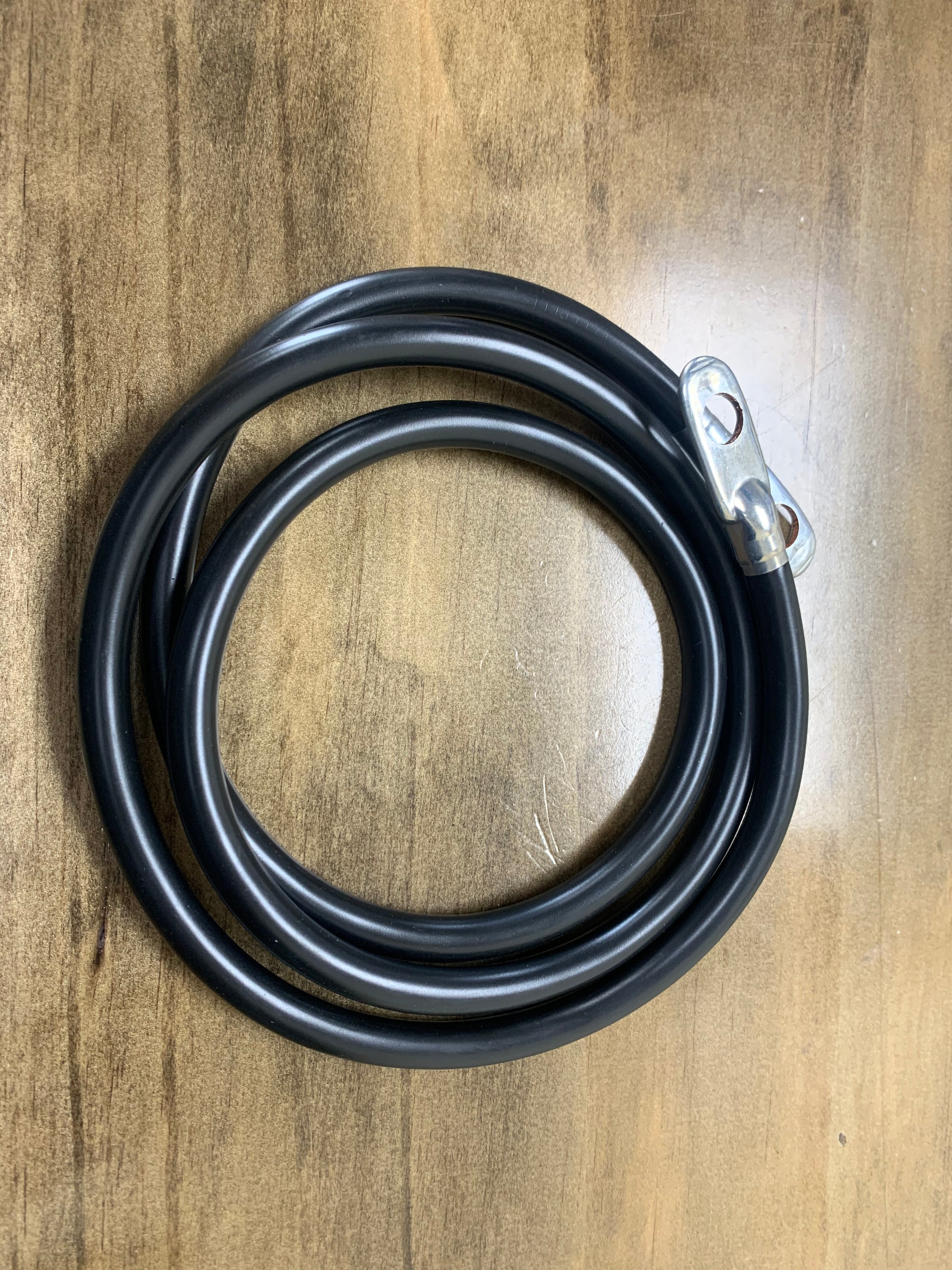 Black electrical cable labeled CABLE BLACK 49 from Tex Trail, suitable for lighting and electrical applications.
