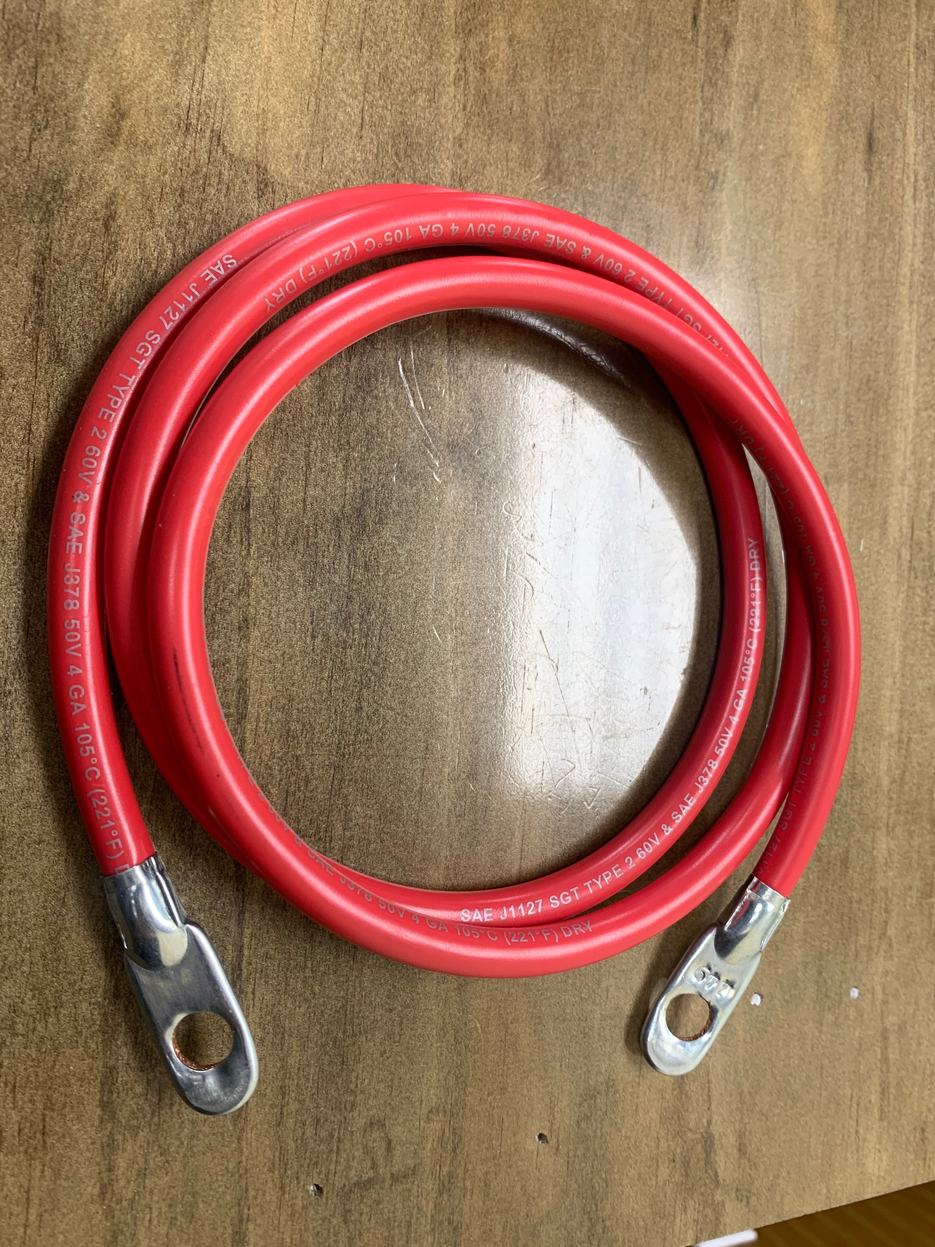Red electrical cable labeled CABLE RED 49 by Tex Trail, displayed with visible connectors and cable length details.