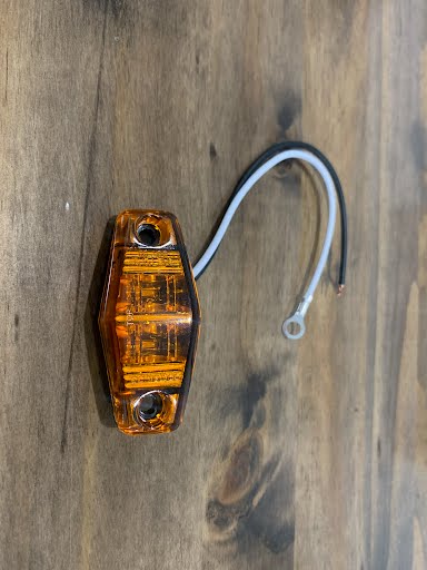 LED C/M Mini Amber Signal Light by Tex Trail, compact electrical light with amber lens for vehicle signaling or illumination.