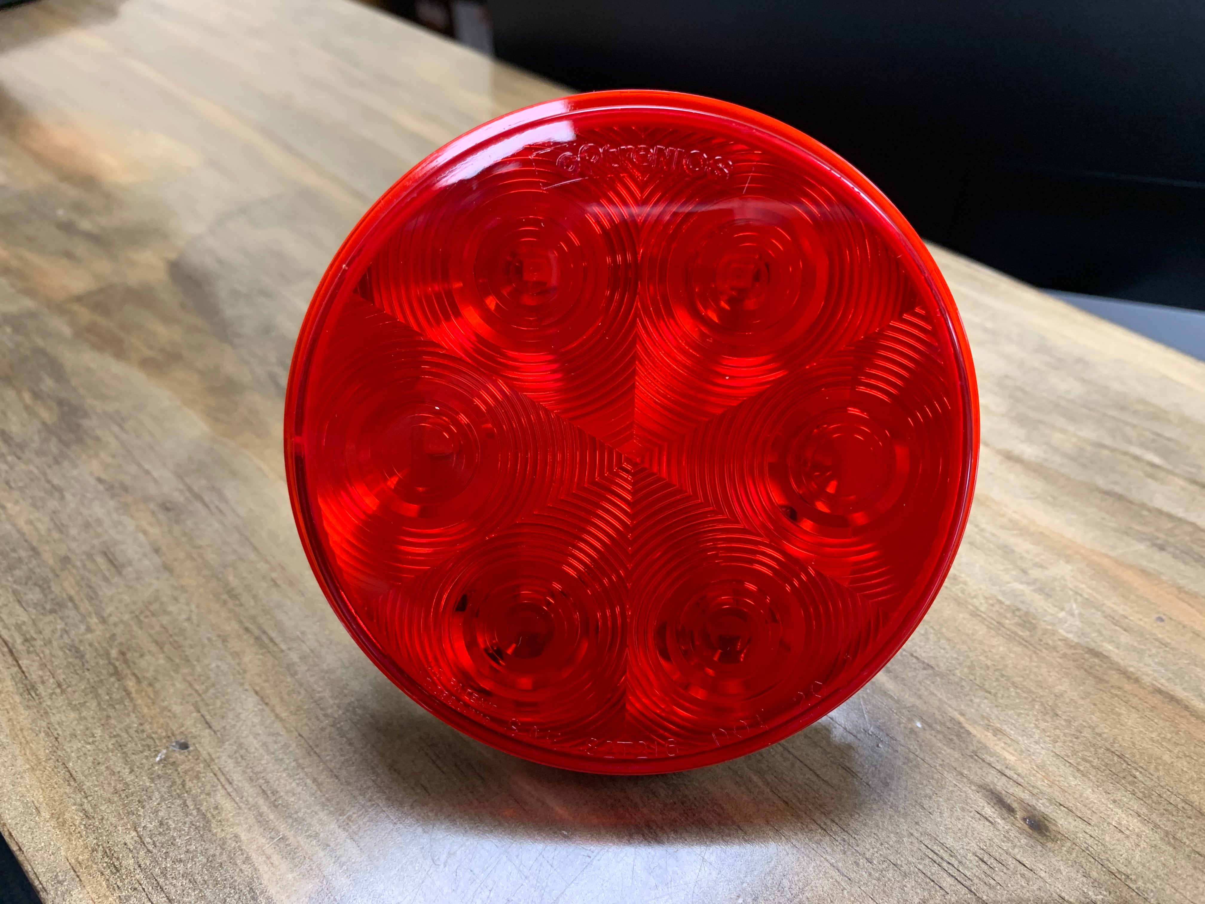 Tex Trail LED stop, tail, and turn light in a 4-inch round flush mount, part number 7D, for vehicle lighting.