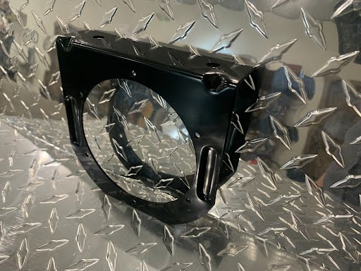 Round 4-inch Tex Trail Light Bracket for electrical and lighting installations, shown in a close-up view.
