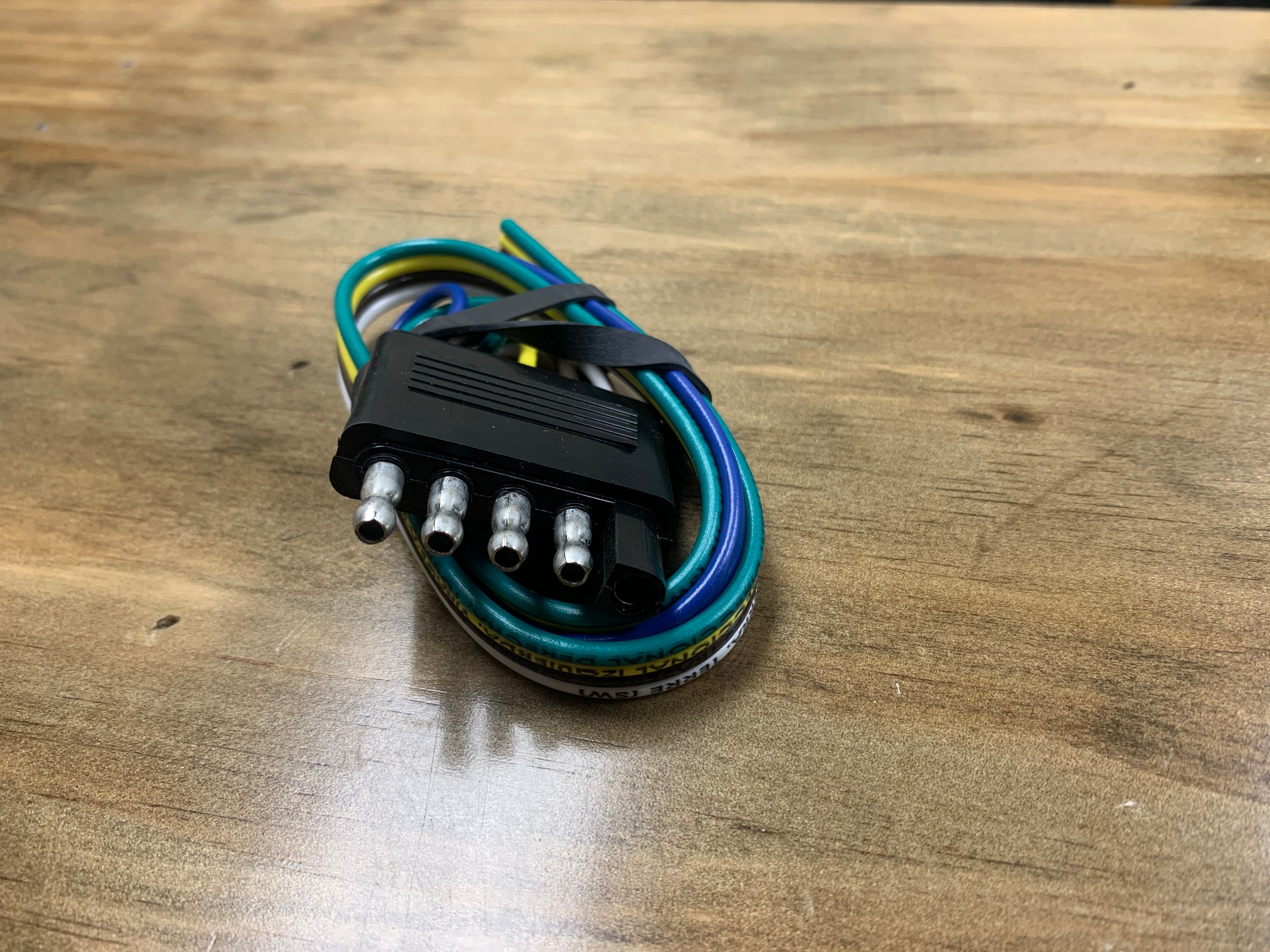 Tex Trail Plug 5 Flat with 18 Lead TRL End, electrical and light accessory, shown with its flat plug and attached lead cable.