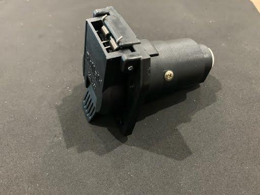 Tex Trail POLLAK Socket 7 RV plastic electrical socket in packaging, suitable for RV electrical connections.
