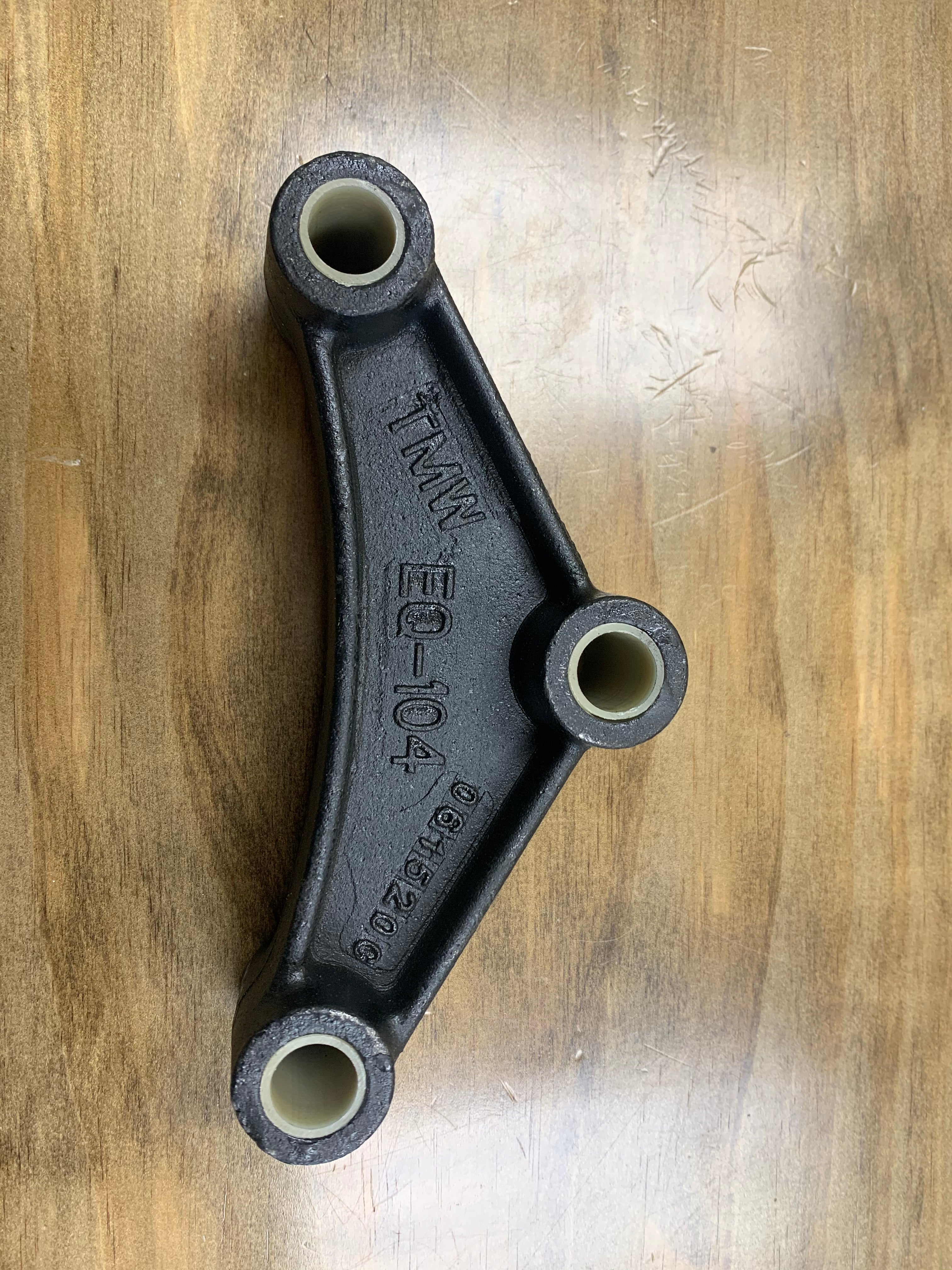 Tex Trail Equalizer Cast 5 3/4-inch curved suspension showing its robust metal construction and mounting features.