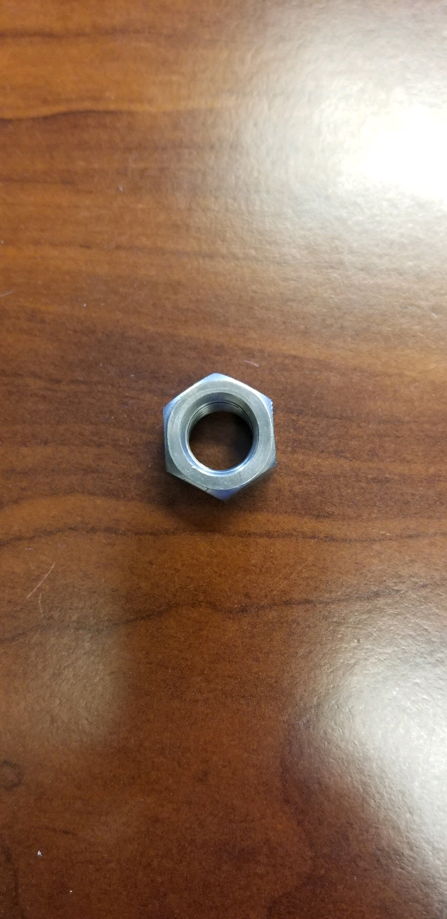 Tex Trail suspension locknut 9/16-18 for secure fitting, shown in image with detailed threading and steel construction.