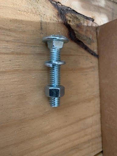 Tex Trail carriage bolt with lock washer and nut, towing accessory for secure fastening and safety applications.