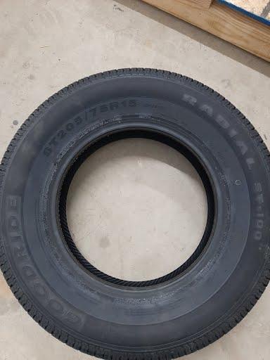 Tex Trail ST205/75R15 tire only with rugged tread pattern, mounted on a black wheel for off-road vehicle use.