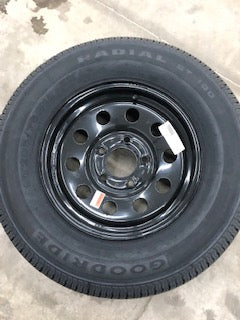 Tex Trail ST205RLRC-155BM550 wheels and tires set, black alloy finish, durable off-road design, mounted on vehicle.